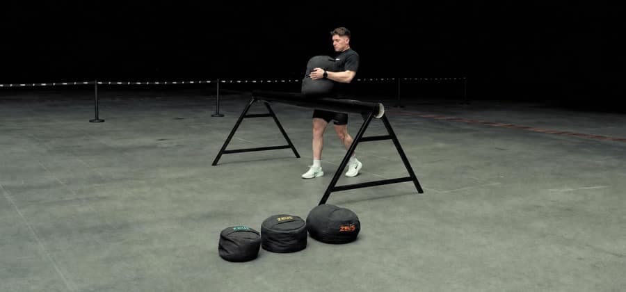 Sandbag Carry Over The Yoke